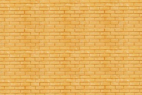 טפט | קיר בריקים בצבע צהוב